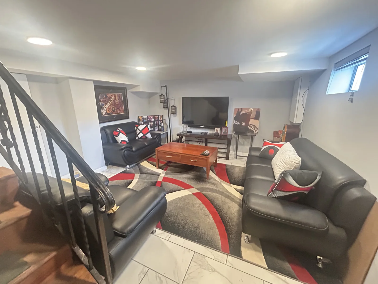 Client-provided photo of a clean, organized living room